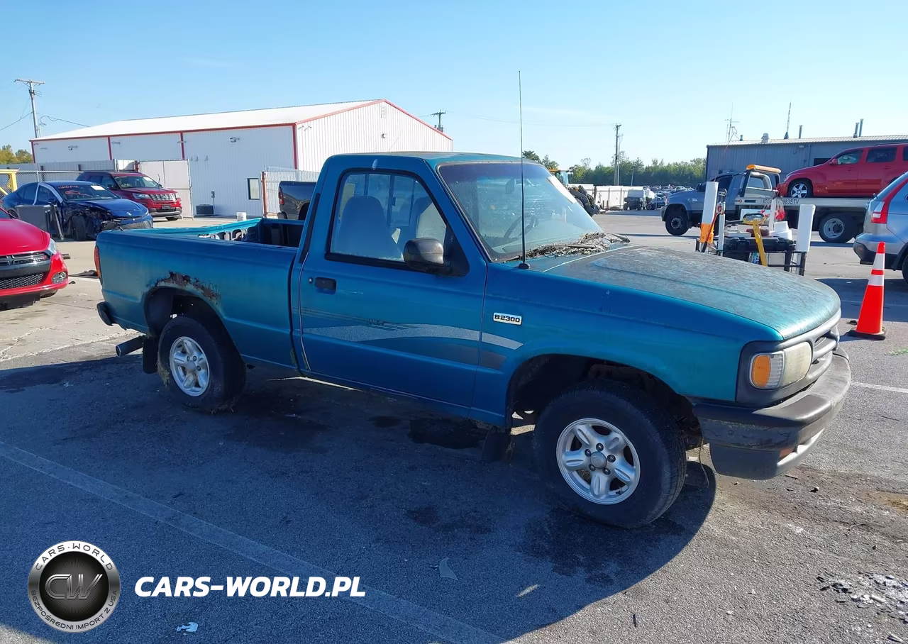 1995 Mazda B2300 VIN:4F4CR12A1STM14220 - 1