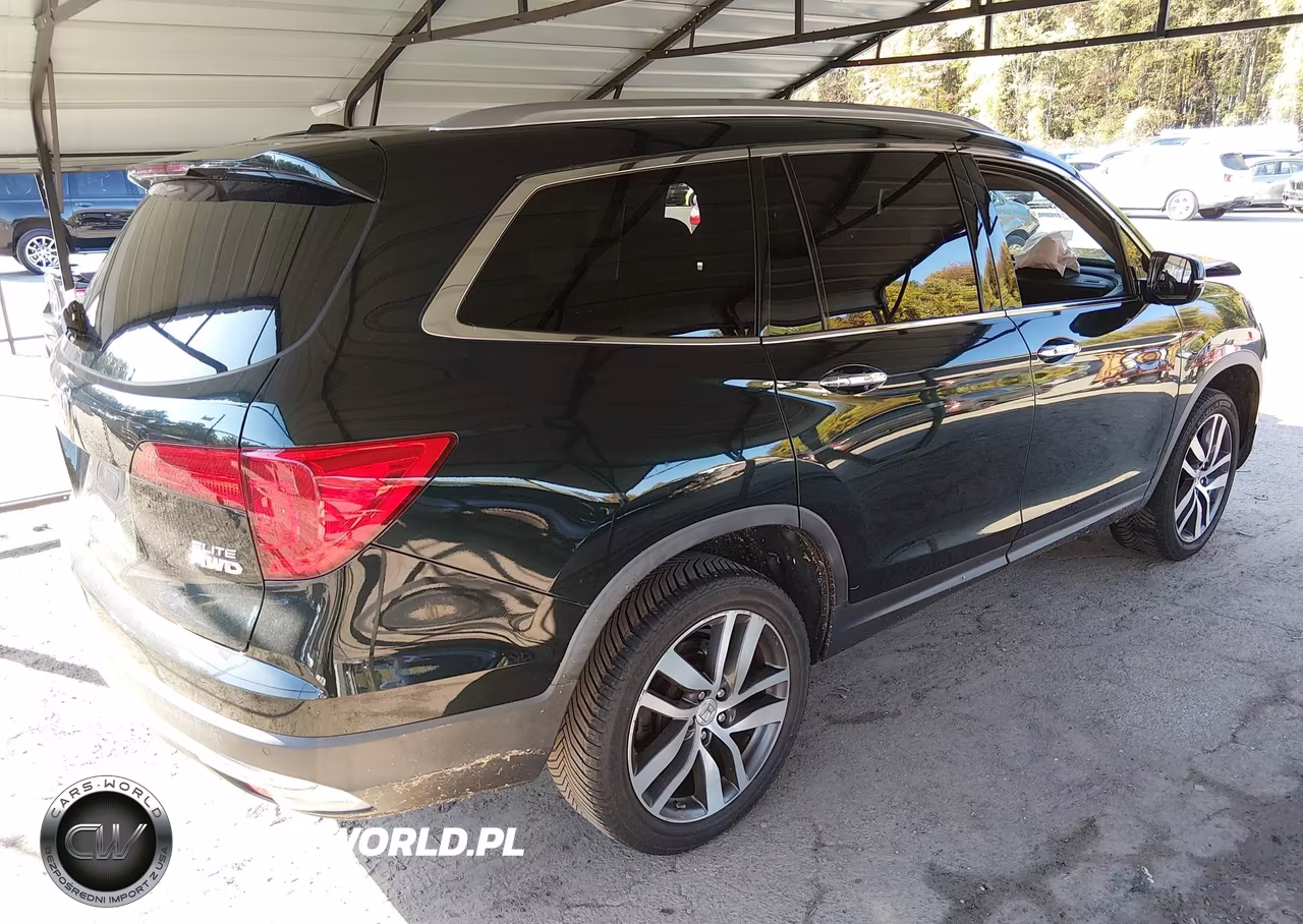 2017 Honda Pilot Elite VIN:5FNYF6H00HB014101 - 4