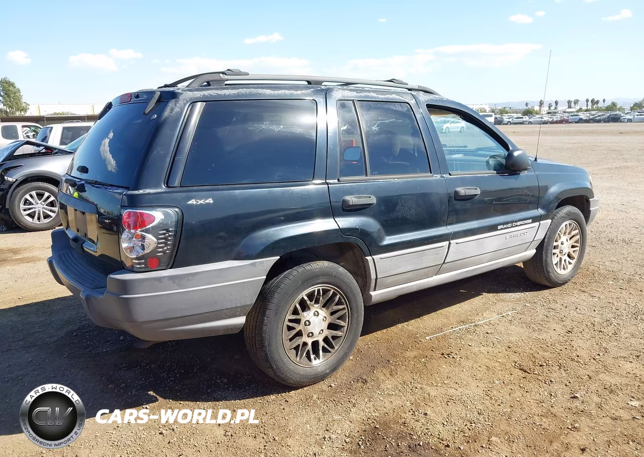1999 Jeep Grand Cherokee Laredo VIN:1J4GW58S6XC571026 - 4