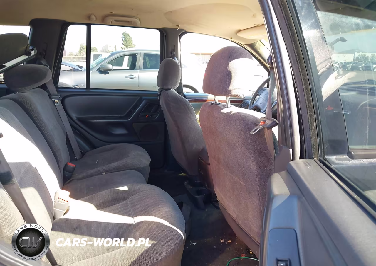1999 Jeep Grand Cherokee Laredo VIN:1J4GW58S6XC571026 - 8
