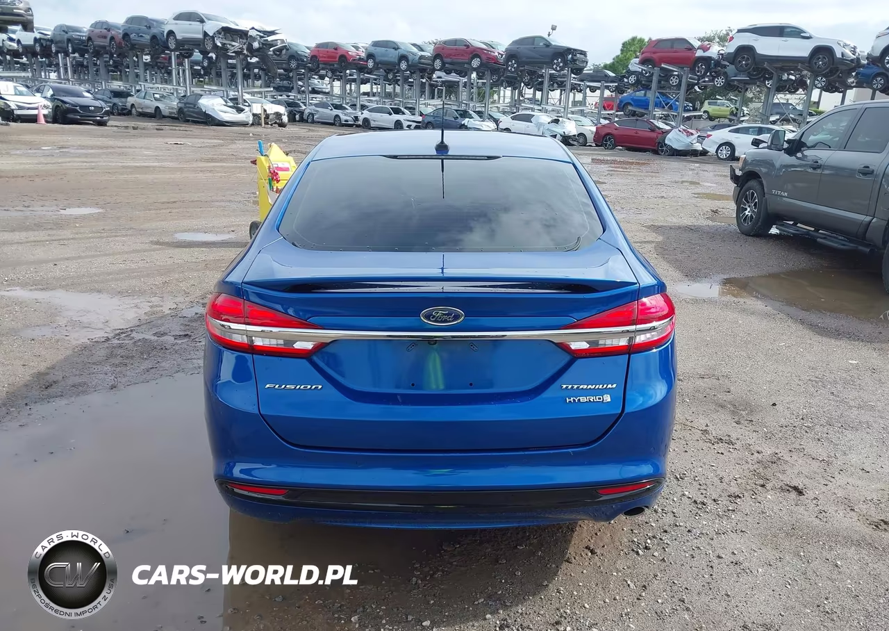 2017 Ford Fusion Hybrid Titanium VIN:3FA6P0RU9HR138083 - 16