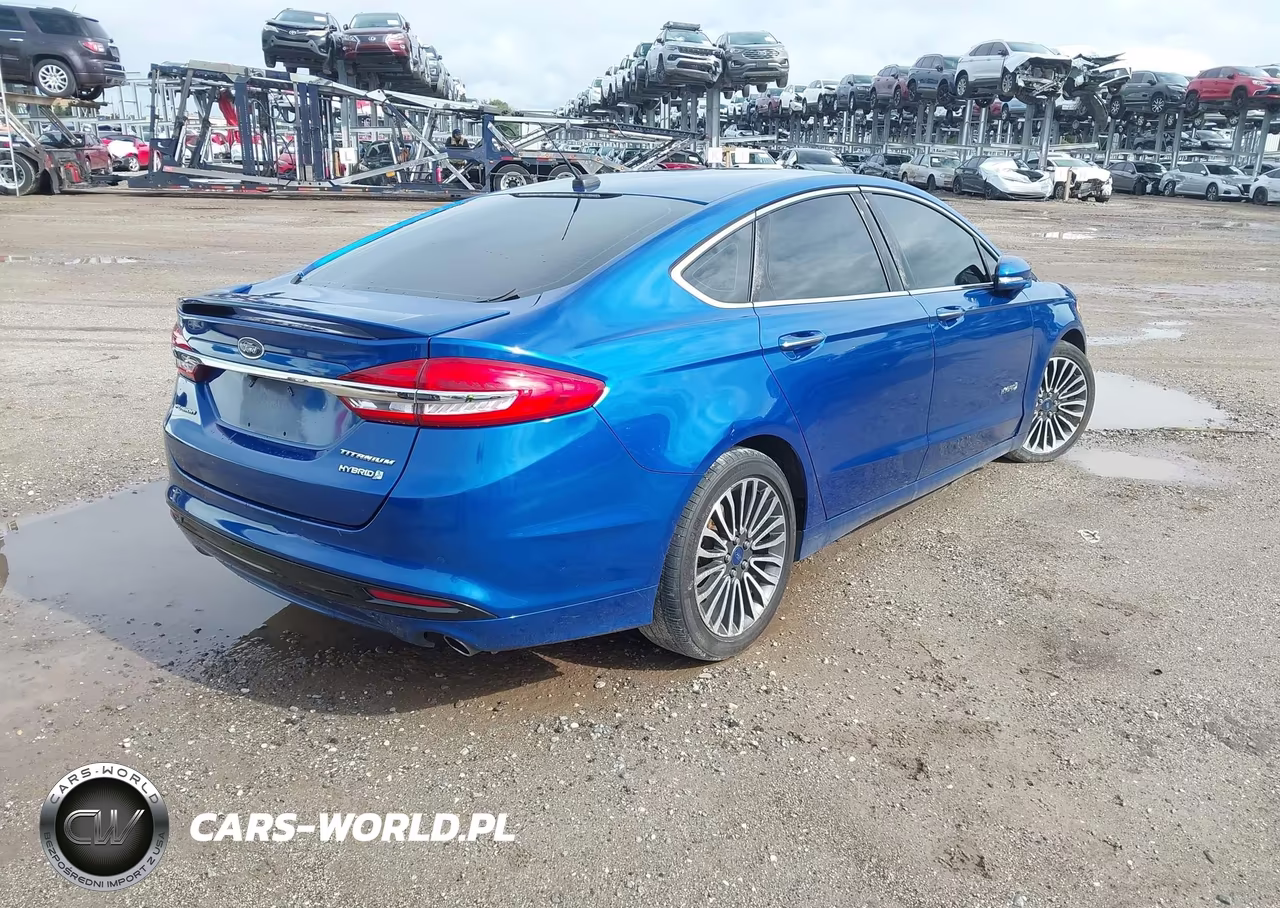 2017 Ford Fusion Hybrid Titanium VIN:3FA6P0RU9HR138083 - 4
