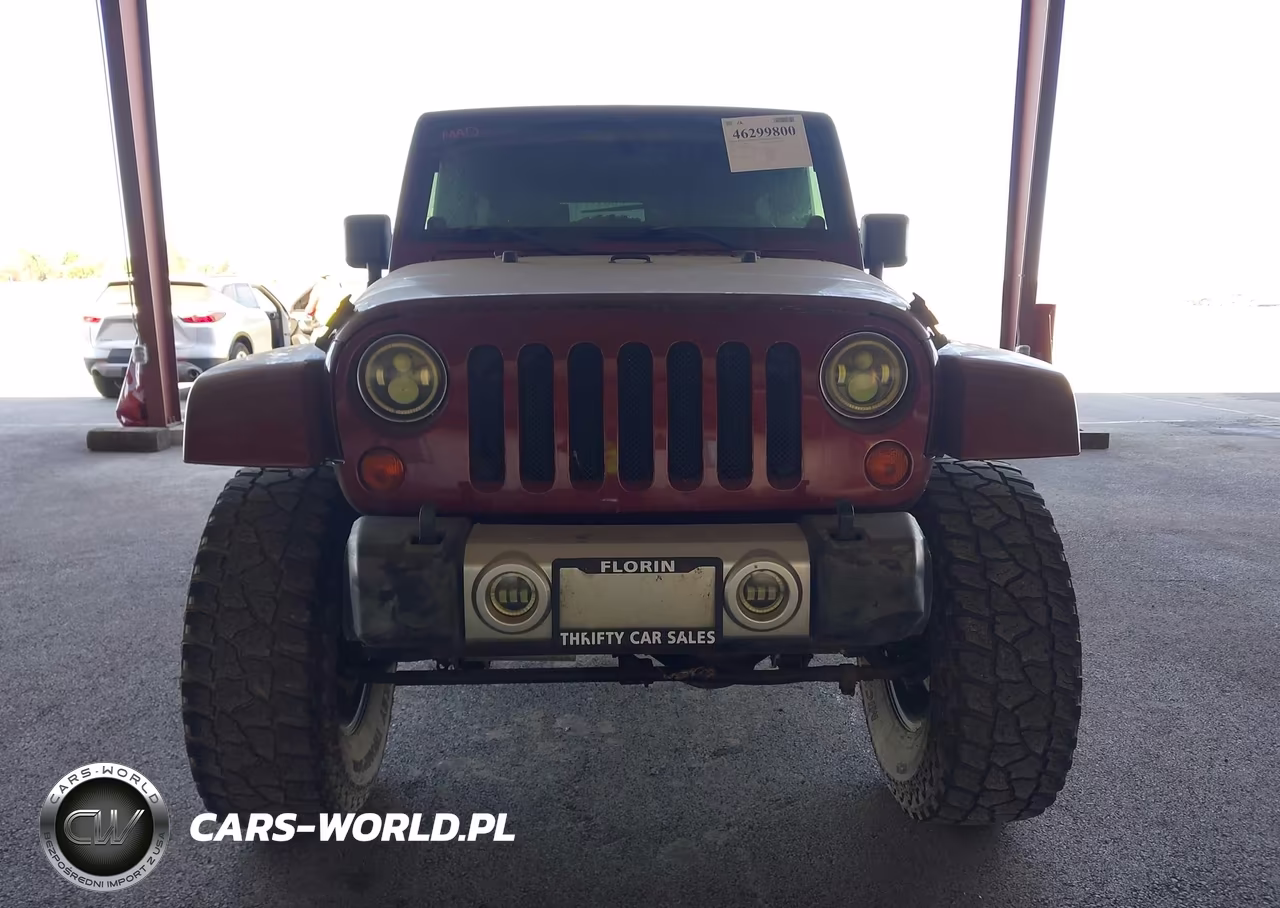 2009 Jeep Wrangler Unlimited Sahara VIN:1J4GA591X9L756364 - 12