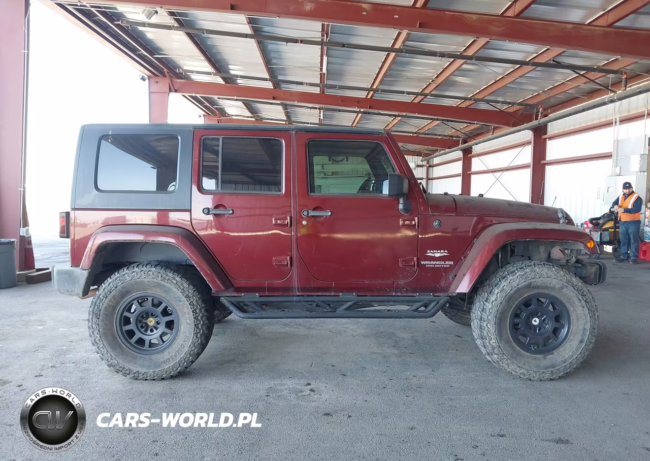2009 Jeep Wrangler Unlimited Sahara VIN:1J4GA591X9L756364 - 13