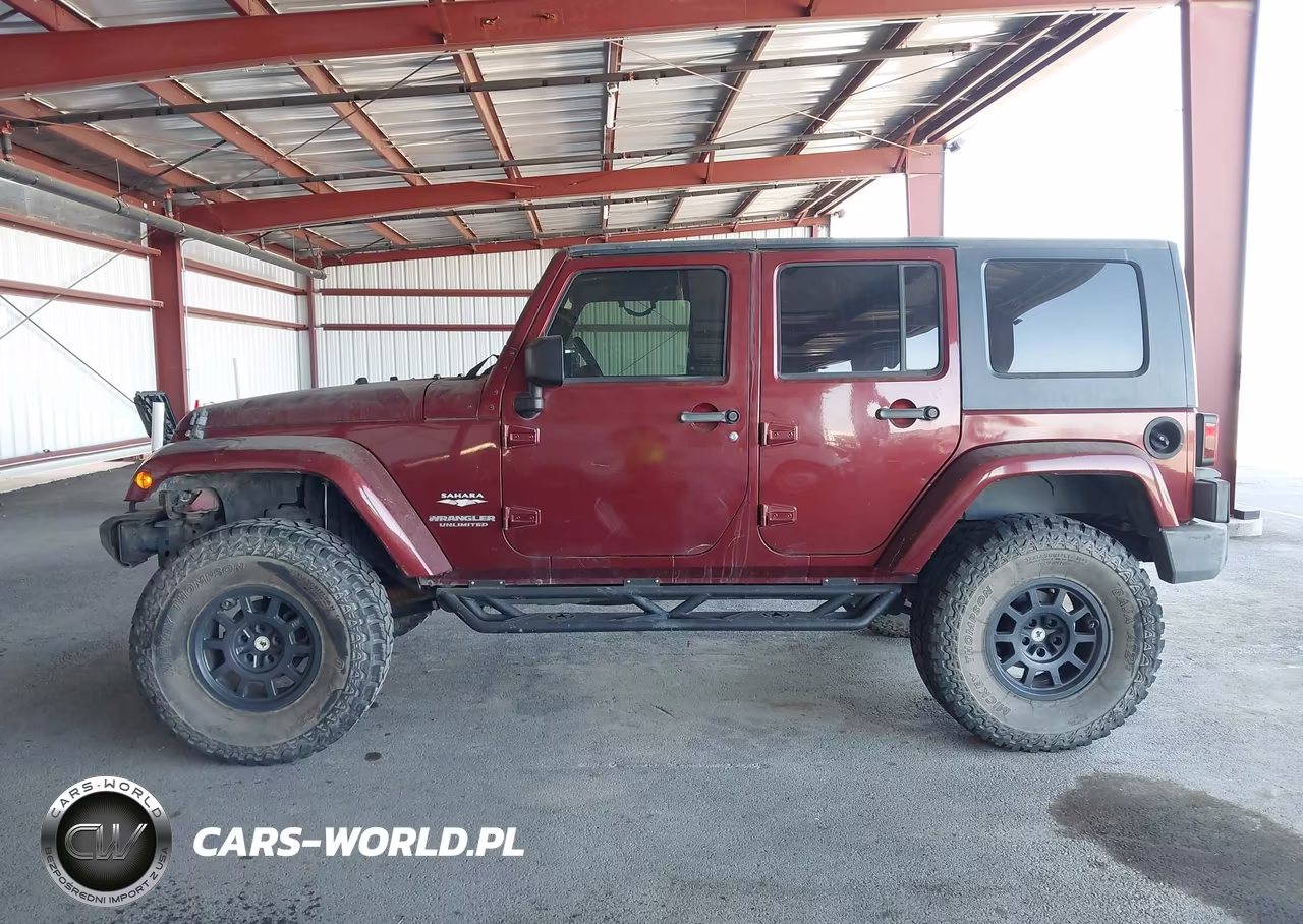 2009 Jeep Wrangler Unlimited Sahara VIN:1J4GA591X9L756364 - 14