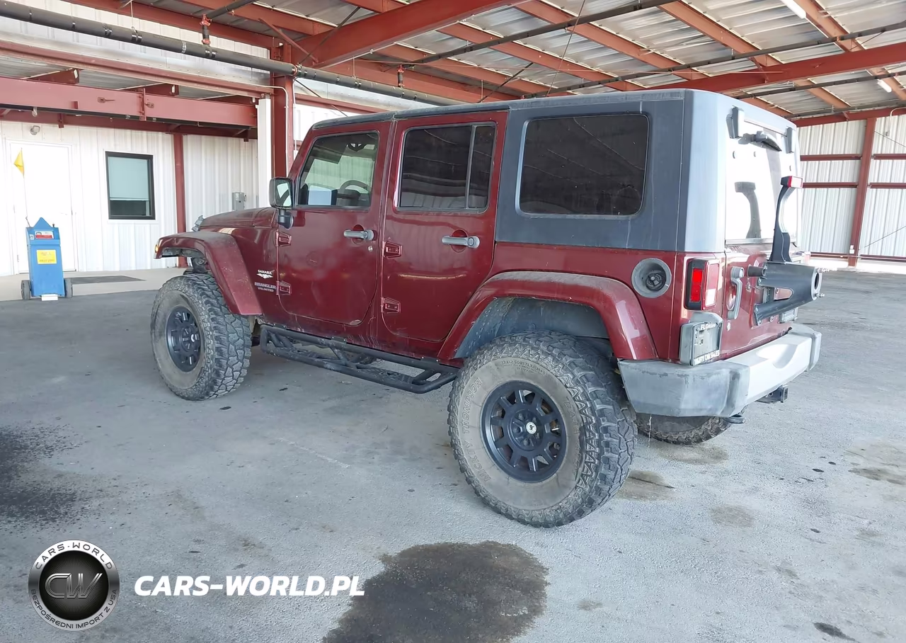 2009 Jeep Wrangler Unlimited Sahara VIN:1J4GA591X9L756364 - 3