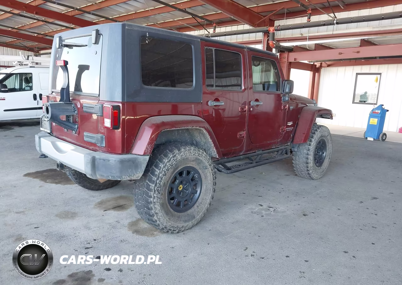2009 Jeep Wrangler Unlimited Sahara VIN:1J4GA591X9L756364 - 4