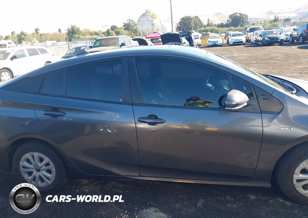 2021 Toyota Prius L Eco VIN:JTDKAMFU4M3128639 - 13
