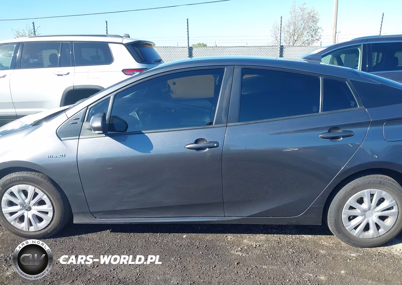 2021 Toyota Prius L Eco VIN:JTDKAMFU4M3128639 - 14