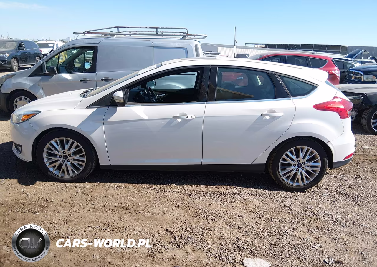 2017 Ford Focus Titanium VIN:1FADP3N26HL230277 - 14