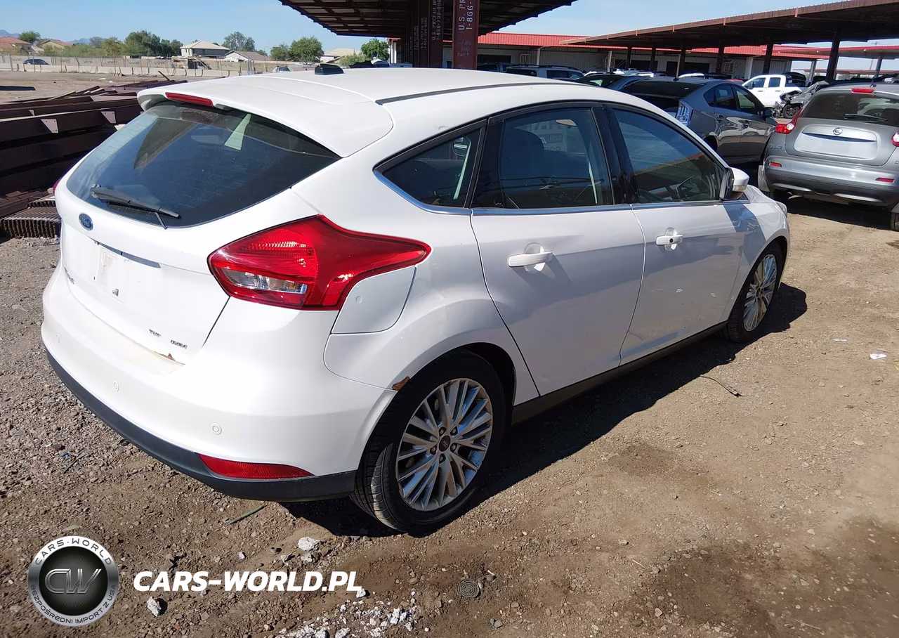2017 Ford Focus Titanium VIN:1FADP3N26HL230277 - 4