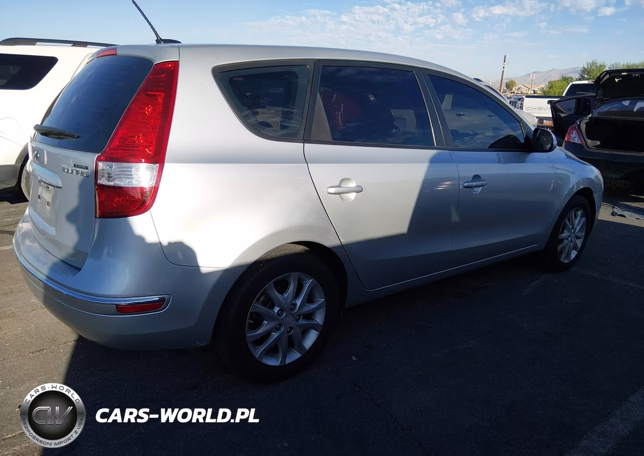 2009 Hyundai Elantra Touring VIN:KMHDC86E49U022143 - 4