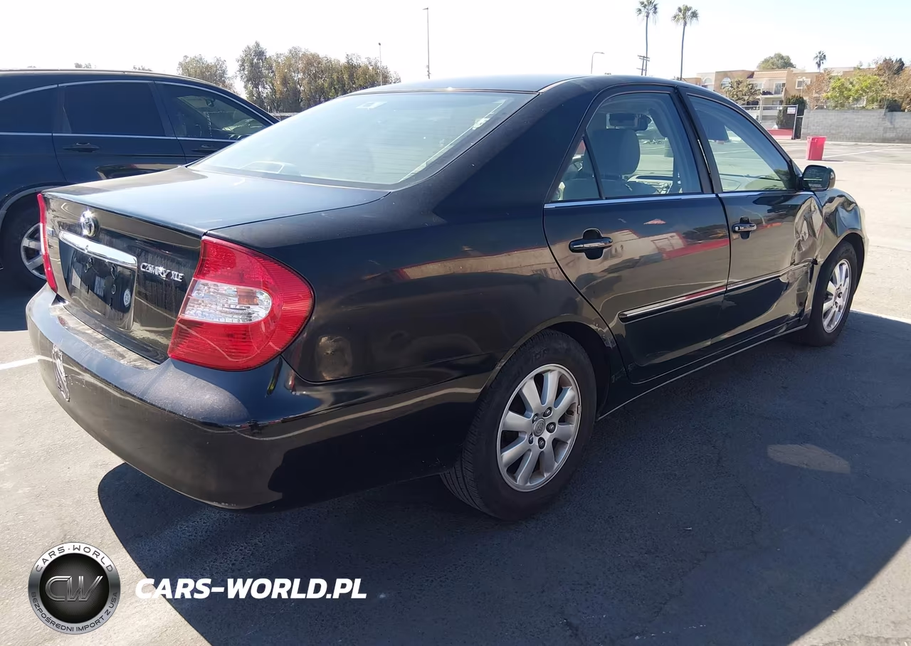 2002 Toyota Camry Xle VIN:JTDBE32K920052806 - 4