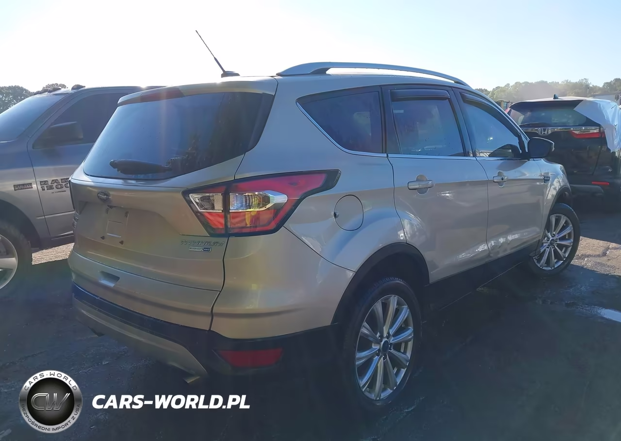 2017 Ford Escape Titanium VIN:1FMCU9J9XHUC94140 - 4