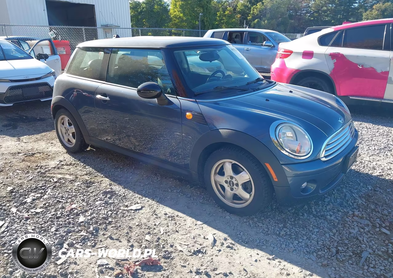 2010 Mini Cooper VIN:WMWMF3C59ATZ24703 - 1