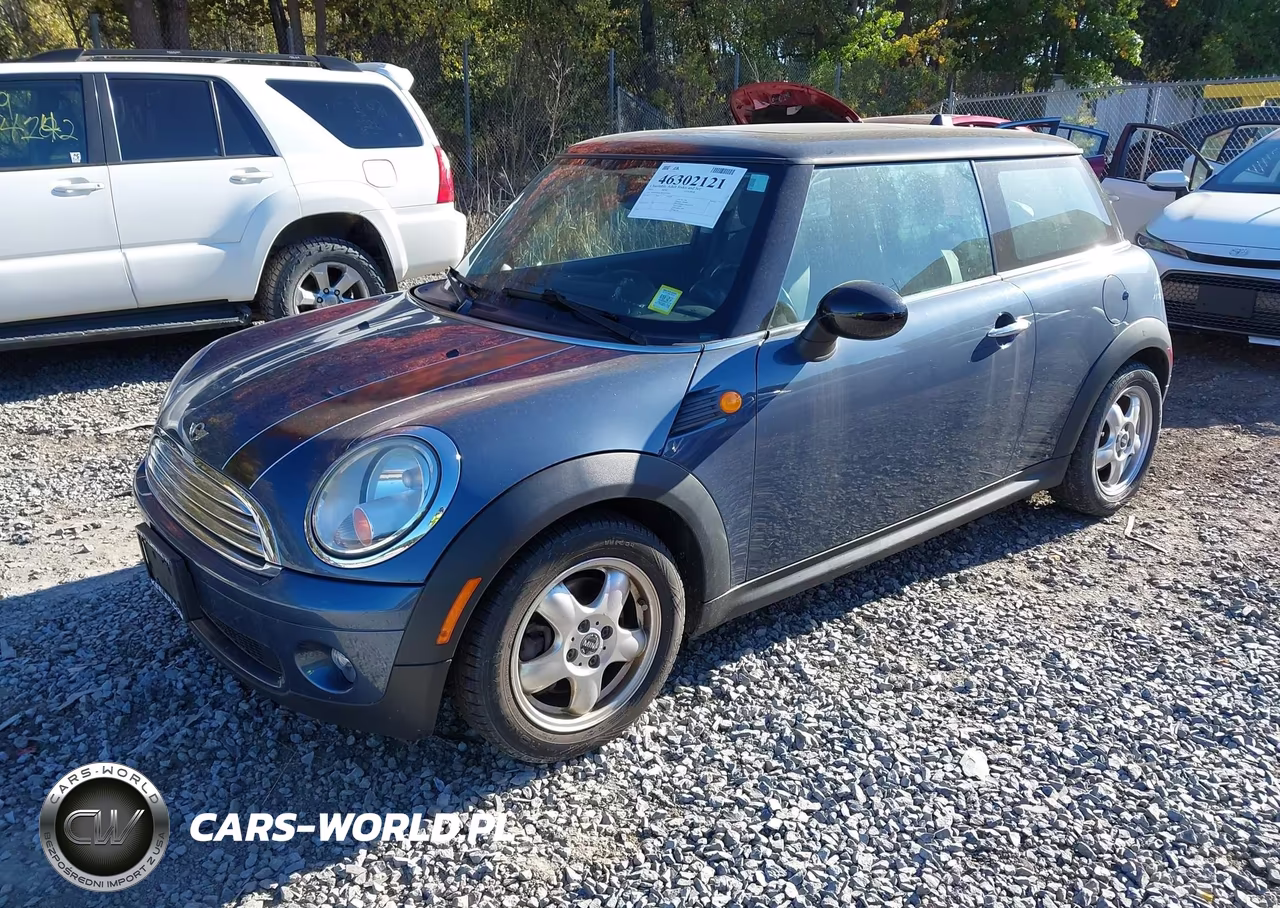 2010 Mini Cooper VIN:WMWMF3C59ATZ24703 - 2