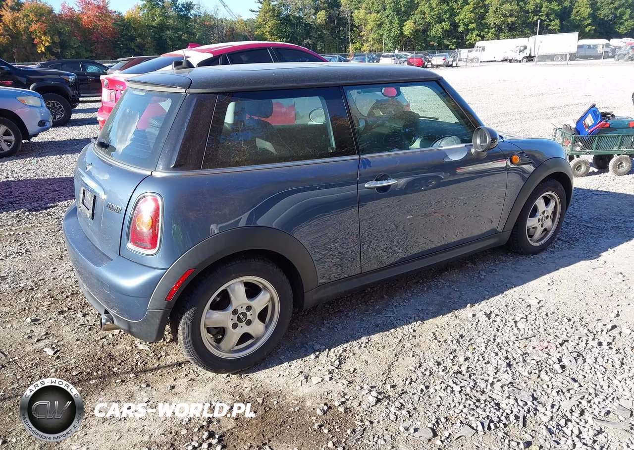 2010 Mini Cooper VIN:WMWMF3C59ATZ24703 - 4