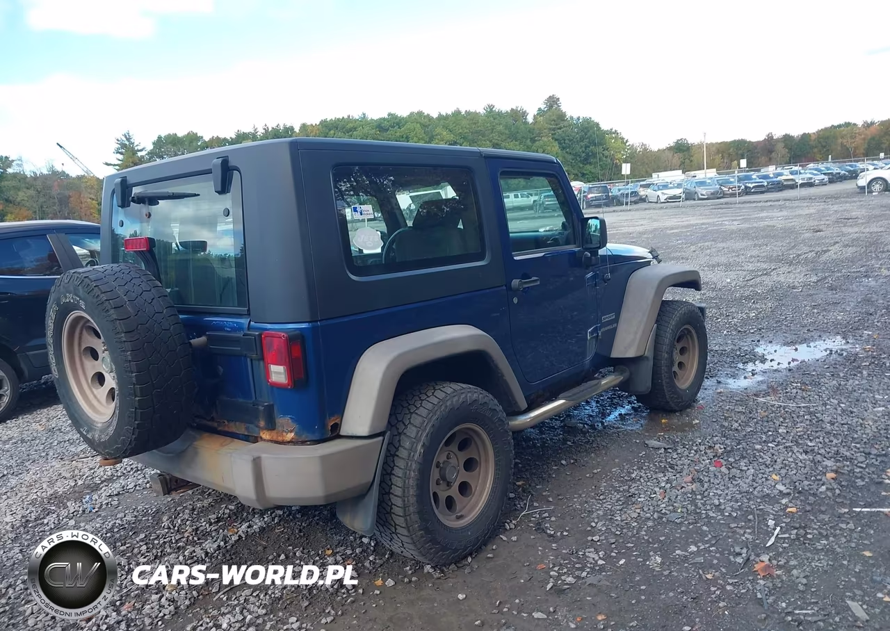 2010 Jeep Wrangler Sport VIN:1J4AA2D10AL124277 - 4