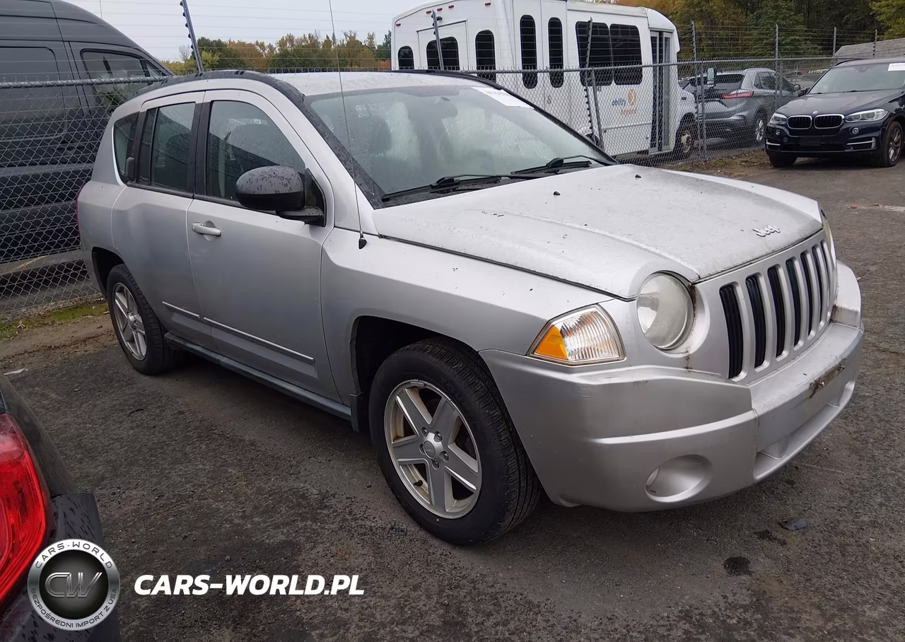 2010 Jeep Compass Sport VIN:1J4NF4FB8AD601648 - 1
