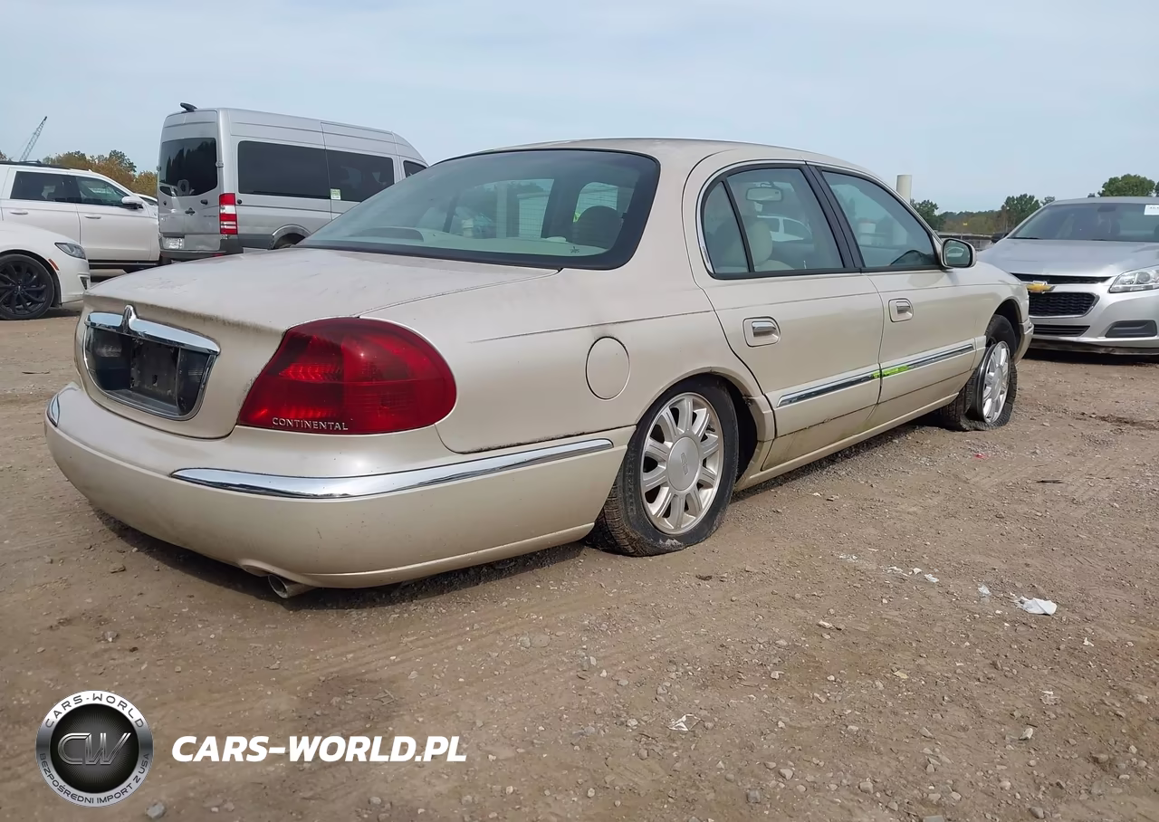2001 Lincoln Continental VIN:1LNHM97V61Y715702 - 4
