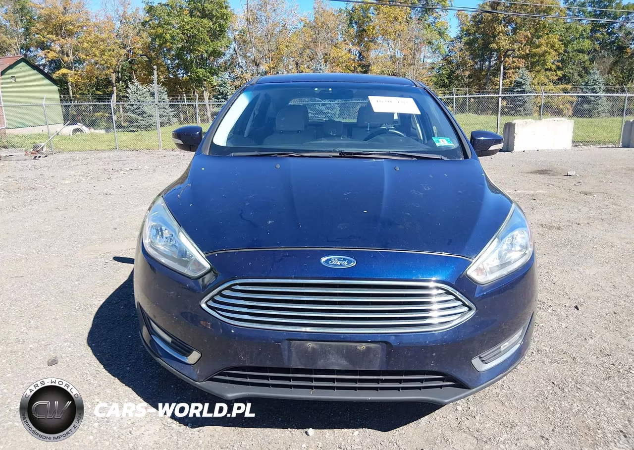 2016 Ford Focus Titanium VIN:1FADP3N27GL299610 - 6