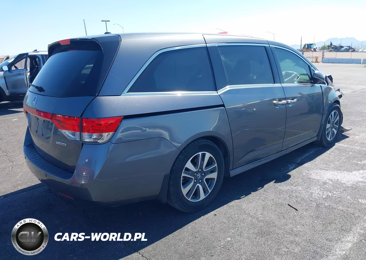 2016 Honda Odyssey Touring-Touring Elite VIN:5FNRL5H98GB142543 - 4