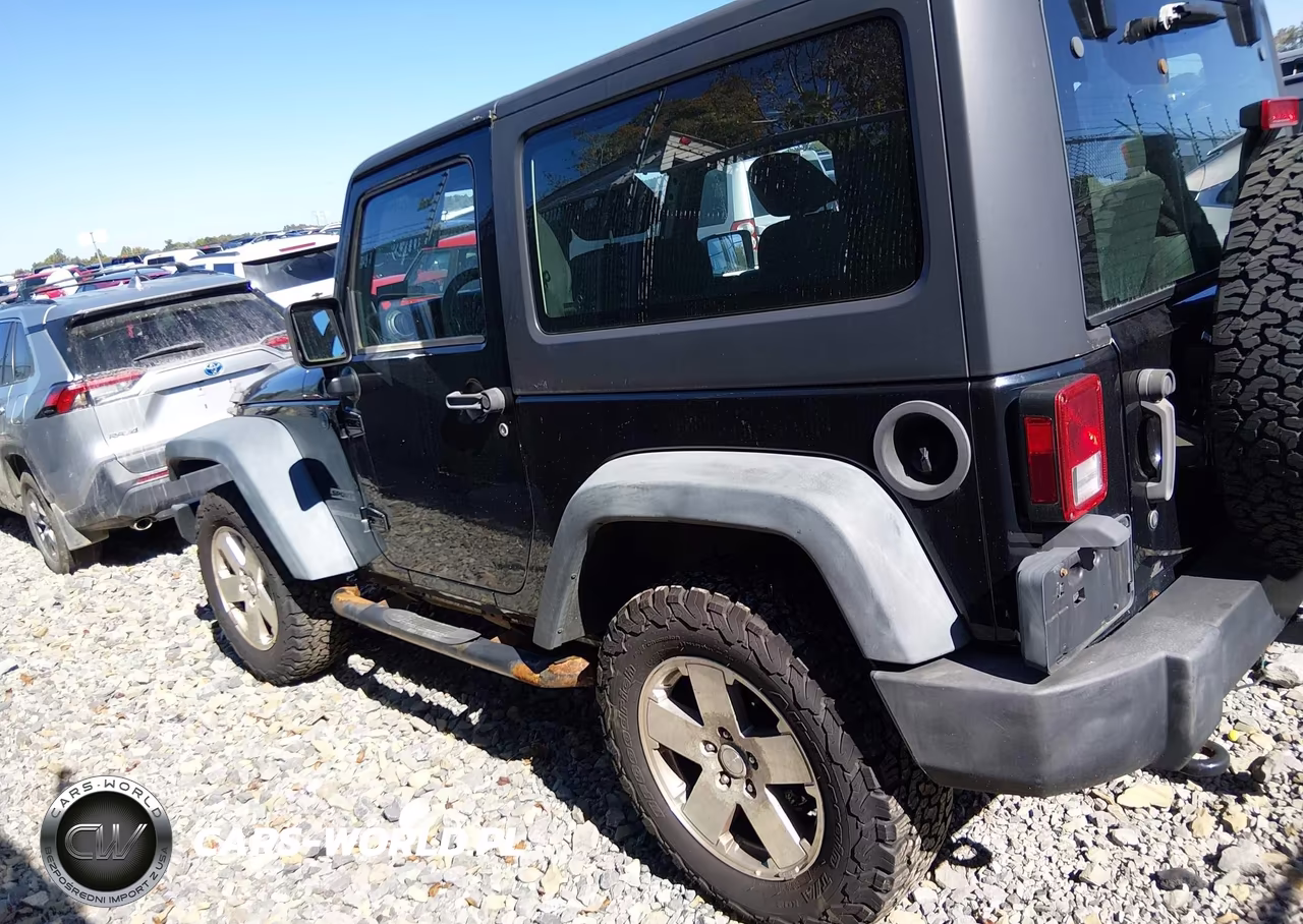 2011 Jeep Wrangler Sport VIN:1J4AA2D10BL547703 - 14