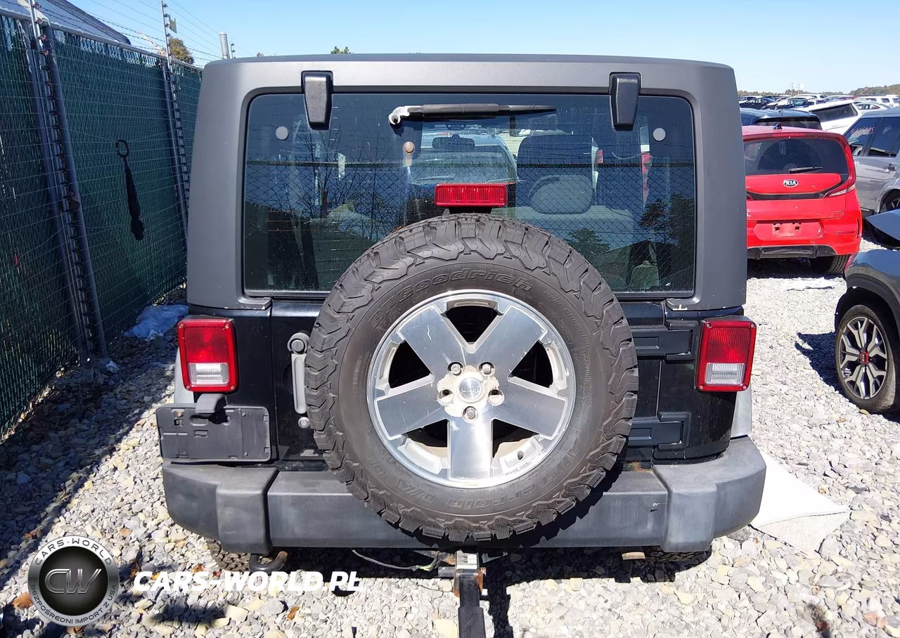 2011 Jeep Wrangler Sport VIN:1J4AA2D10BL547703 - 16