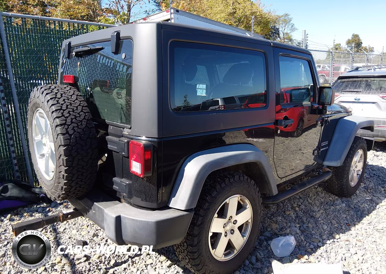 2011 Jeep Wrangler Sport VIN:1J4AA2D10BL547703 - 4