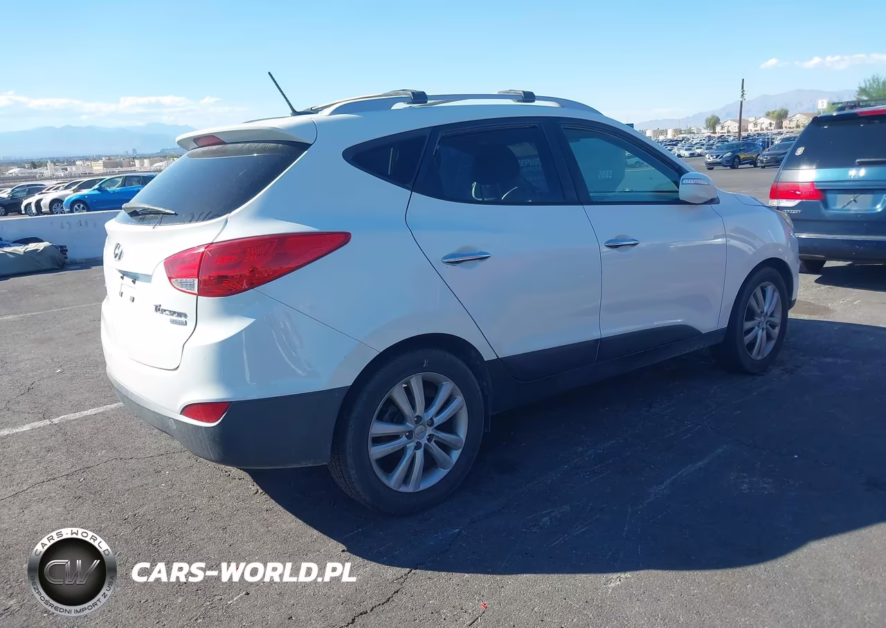 2012 Hyundai Tucson Limited VIN:KM8JU3AC2CU483650 - 4