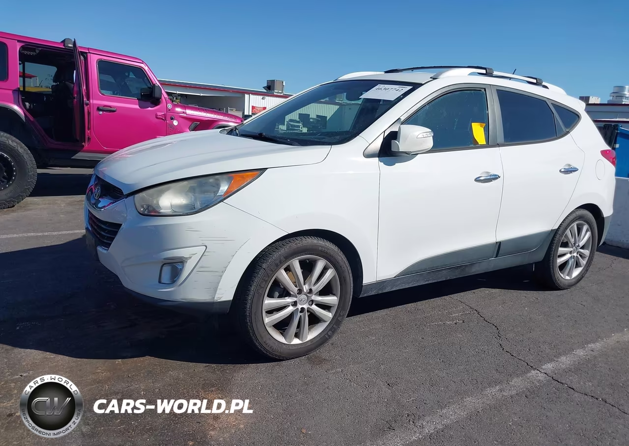 2012 Hyundai Tucson Limited VIN:KM8JU3AC2CU483650 - 6