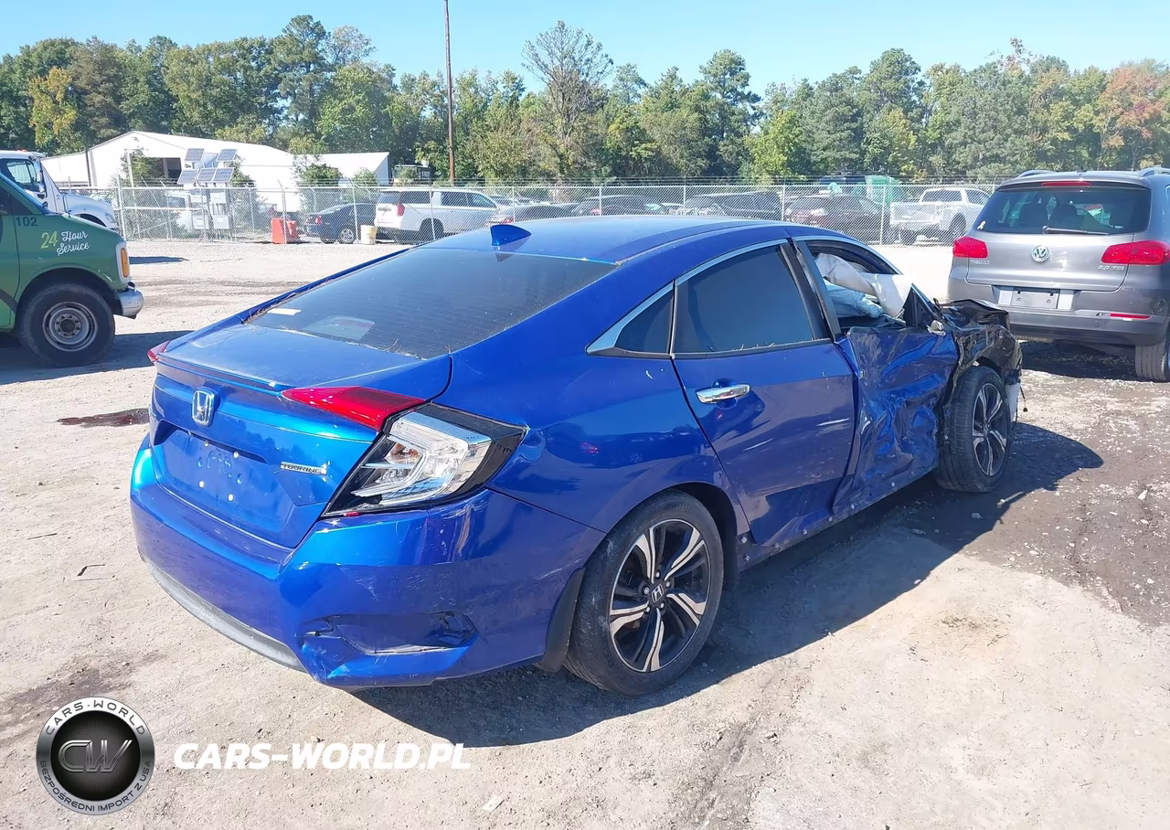 2017 Honda Civic Touring VIN:2HGFC1F90HH653336 - 4