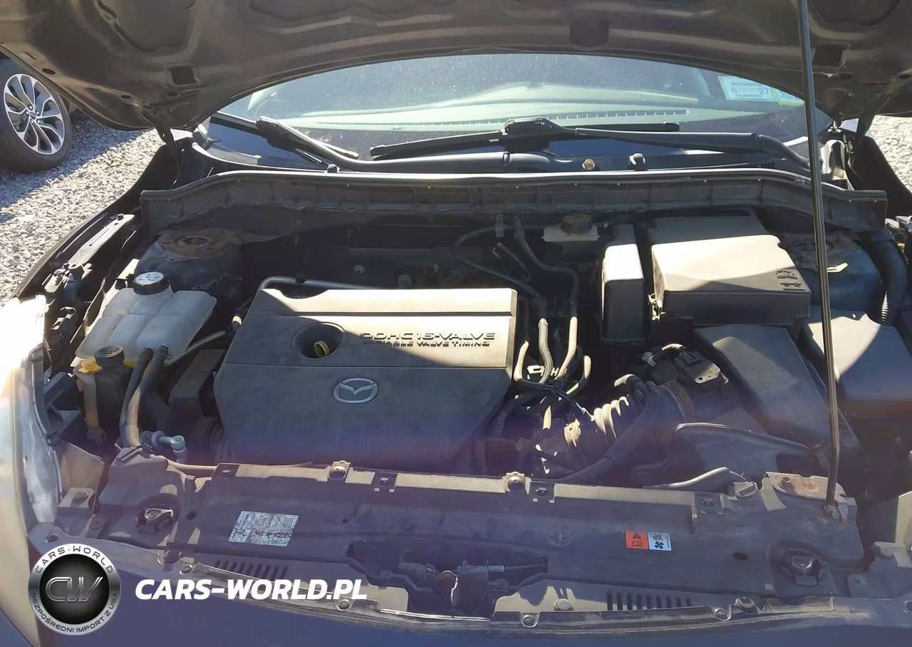 2011 Mazda Mazda3 I Touring VIN:JM1BL1VG6B1400234 - 10