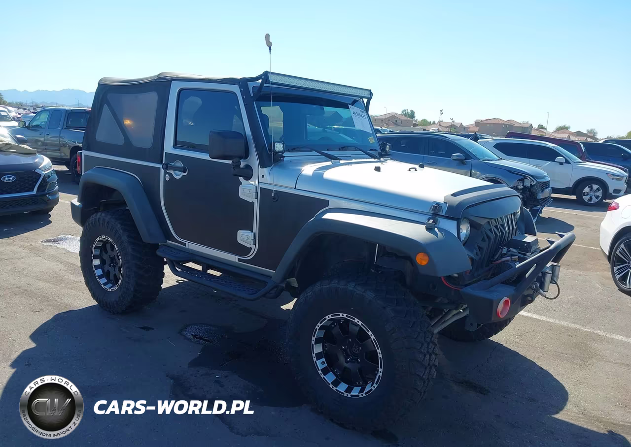 2011 Jeep Wrangler Sport VIN:1J4AA2D16BL619486 - 1