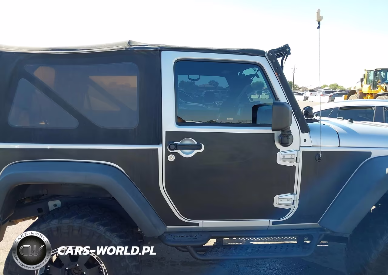 2011 Jeep Wrangler Sport VIN:1J4AA2D16BL619486 - 13