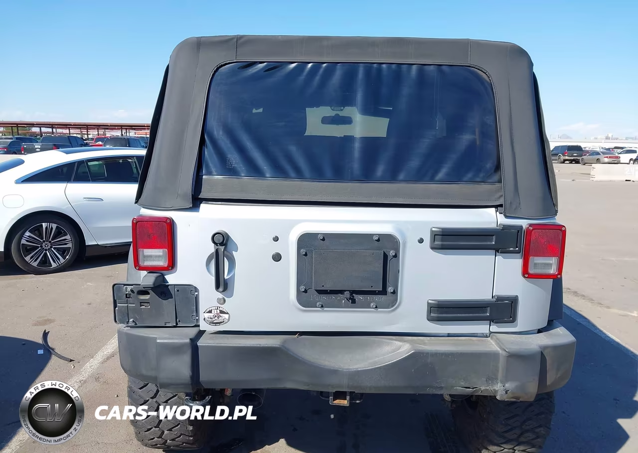 2011 Jeep Wrangler Sport VIN:1J4AA2D16BL619486 - 16