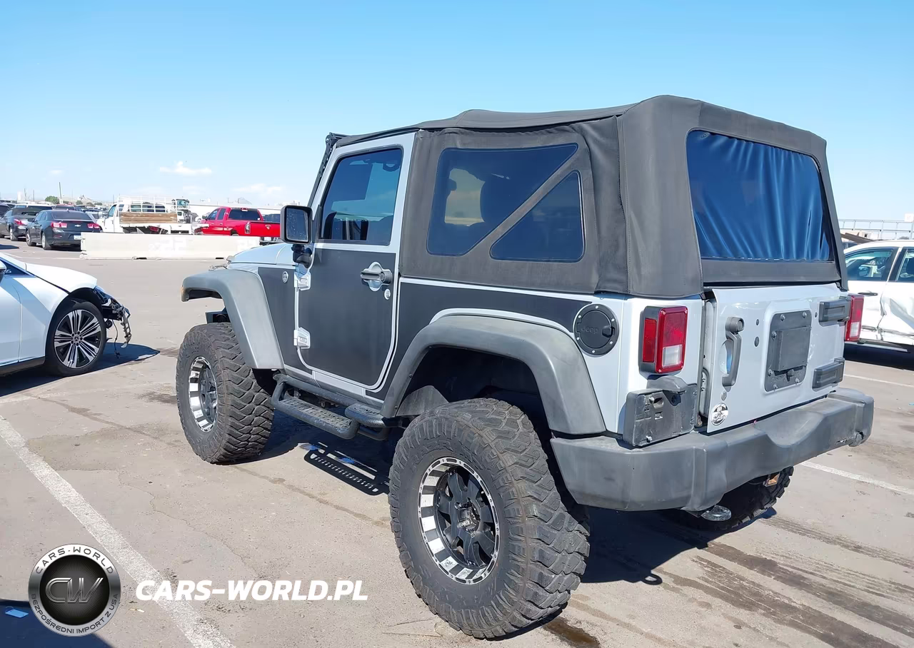2011 Jeep Wrangler Sport VIN:1J4AA2D16BL619486 - 3