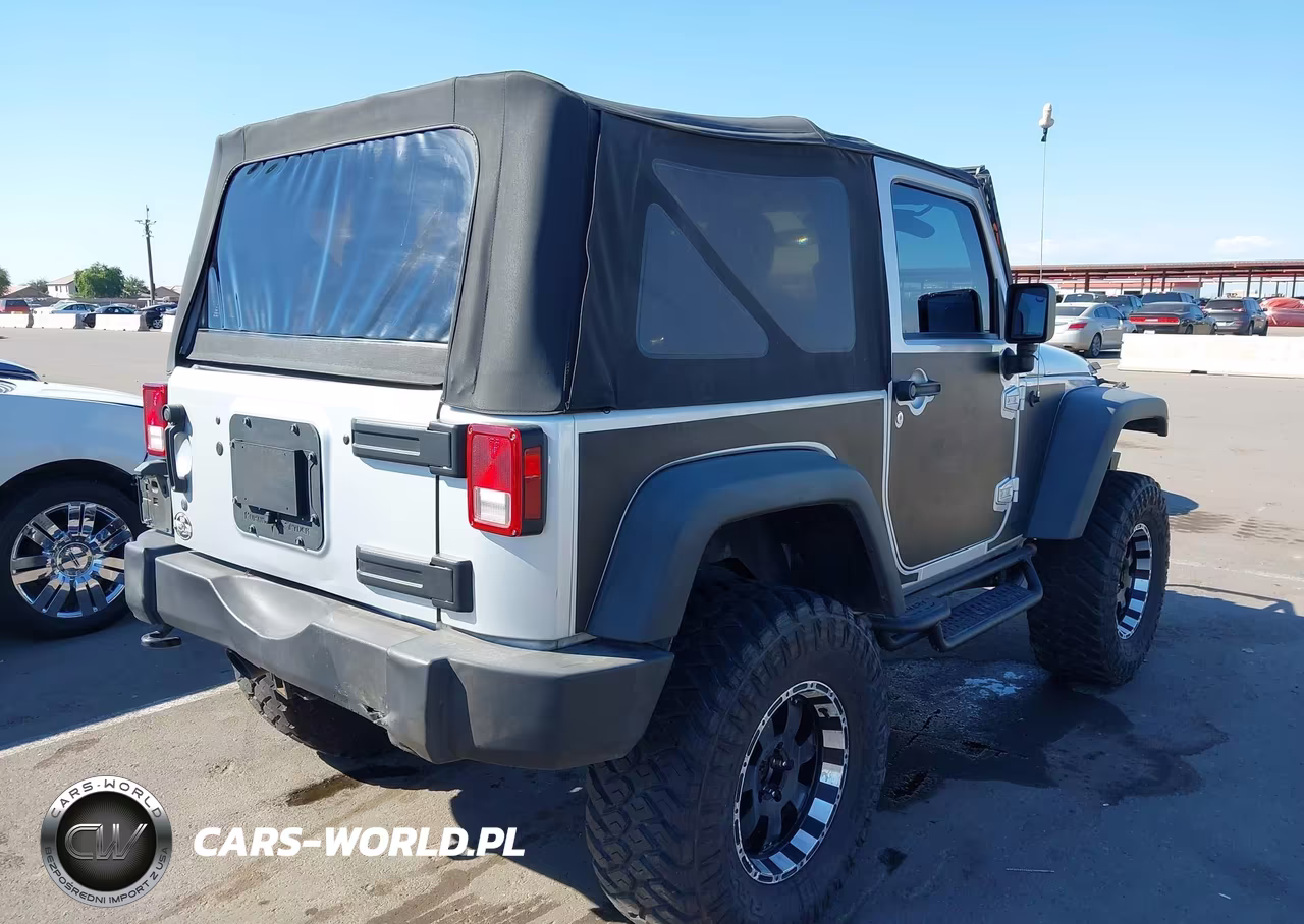 2011 Jeep Wrangler Sport VIN:1J4AA2D16BL619486 - 4