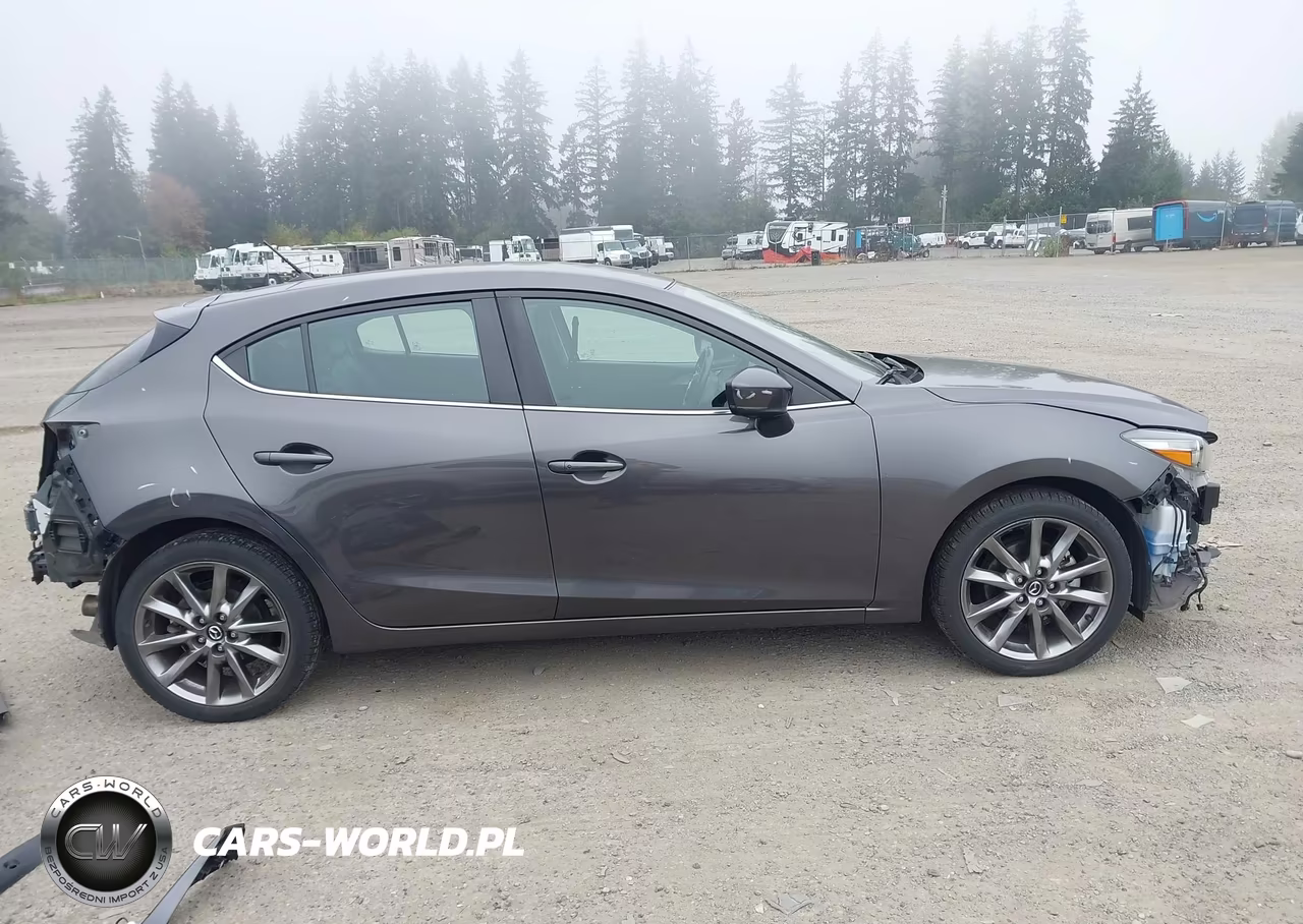 2018 Mazda Mazda3 Touring VIN:3MZBN1L34JM160108 - 14