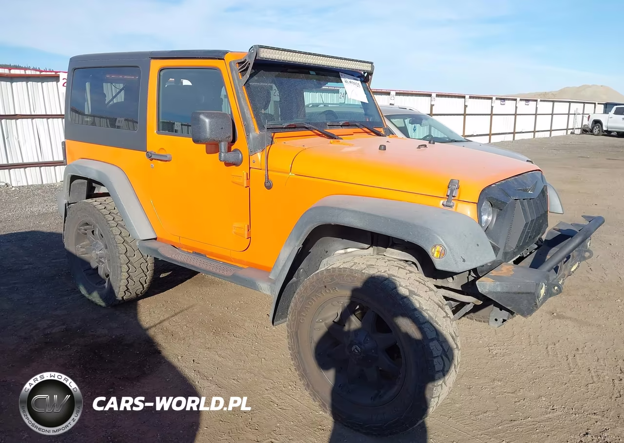 2012 Jeep Wrangler Sport VIN:1C4AJWAG2CL187924 - 1