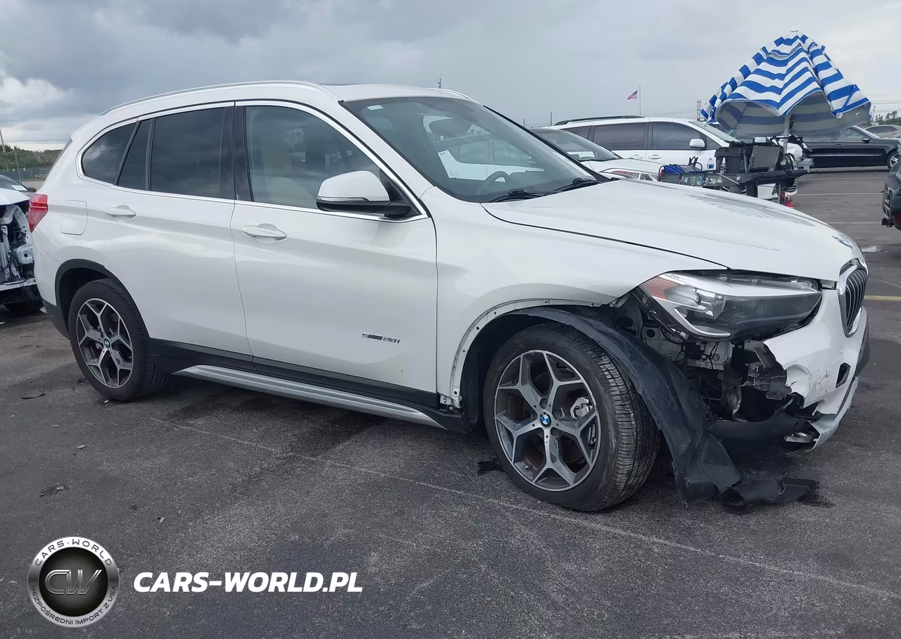 2017 BMW X1 Sdrive28I VIN:WBXHU7C33HP924640 - 1