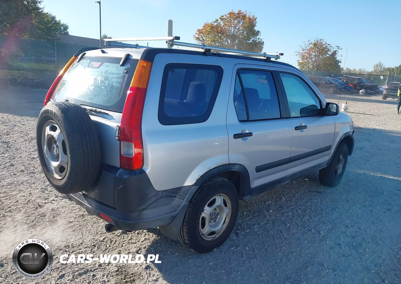 2002 Honda Cr-V Lx VIN:JHLRD78422C058952 - 4