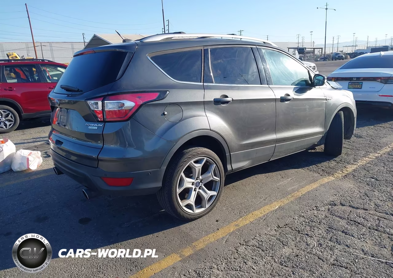 2017 Ford Escape Titanium VIN:1FMCU0J99HUD59331 - 4