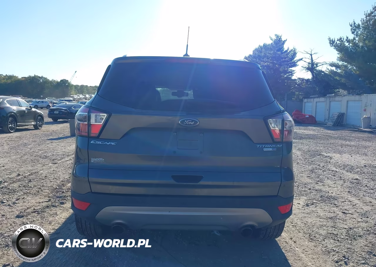 2017 Ford Escape Titanium VIN:1FMCU9J92HUD95608 - 16