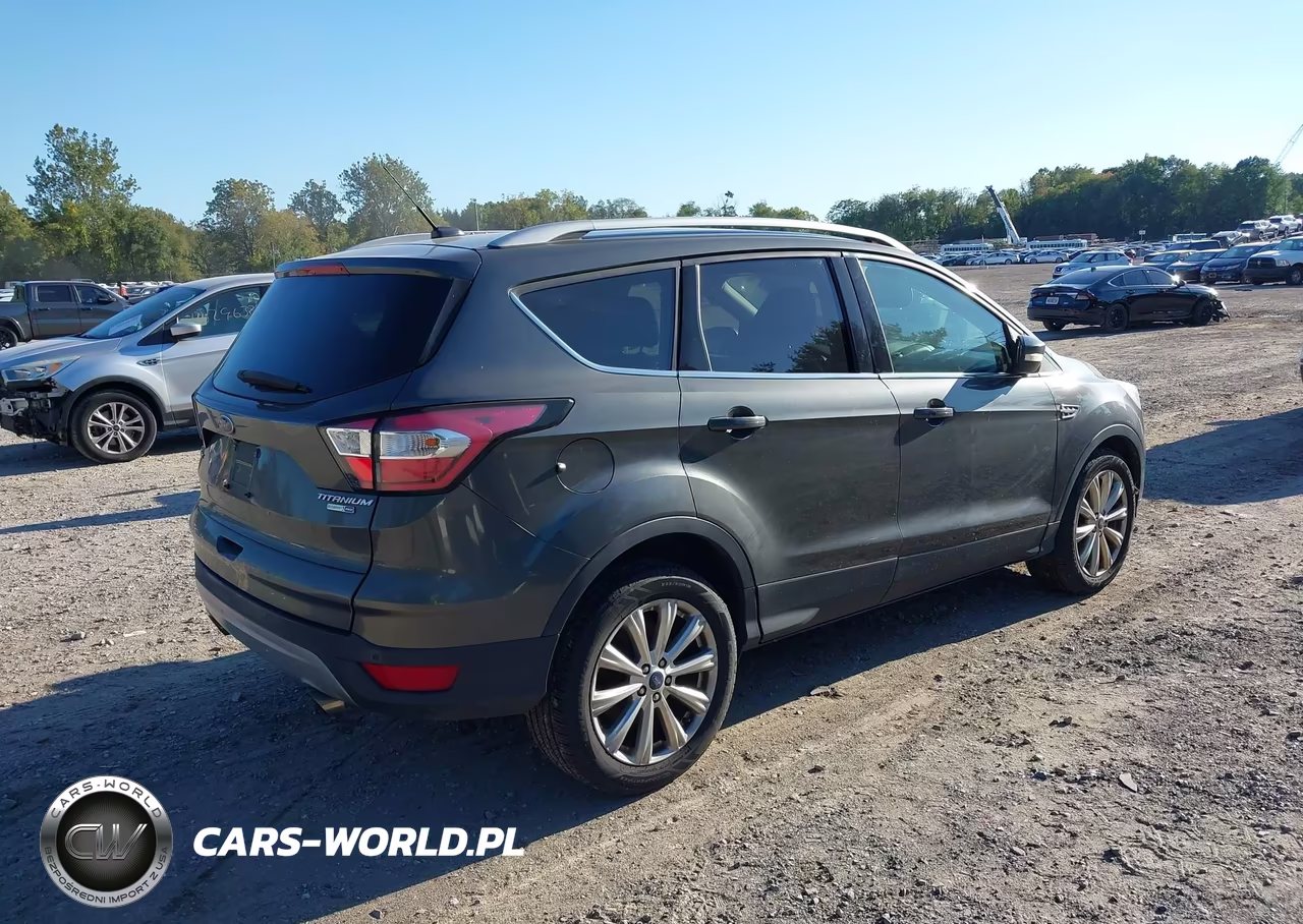 2017 Ford Escape Titanium VIN:1FMCU9J92HUD95608 - 4