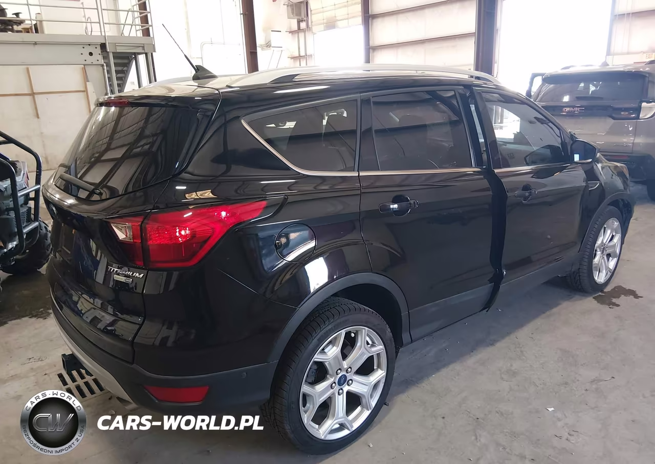 2019 Ford Escape Titanium VIN:1FMCU9J9XKUC04055 - 4