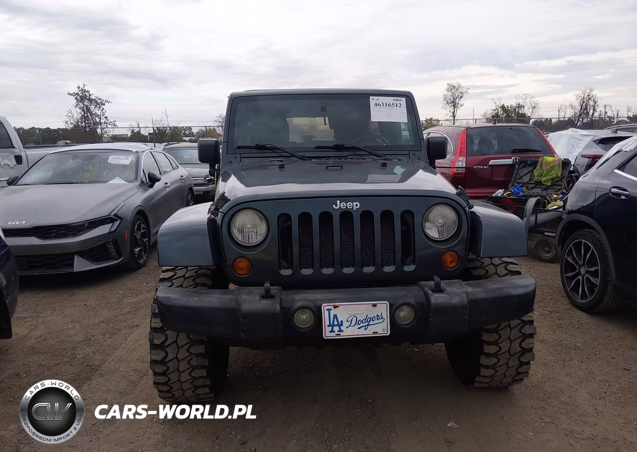 2007 Jeep Wrangler Unlimited Sahara VIN:1J4GA59187L142104 - 12