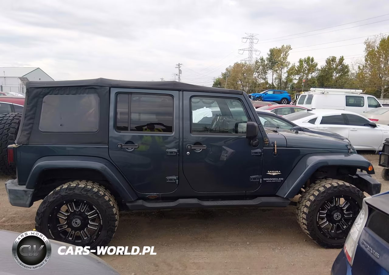 2007 Jeep Wrangler Unlimited Sahara VIN:1J4GA59187L142104 - 13