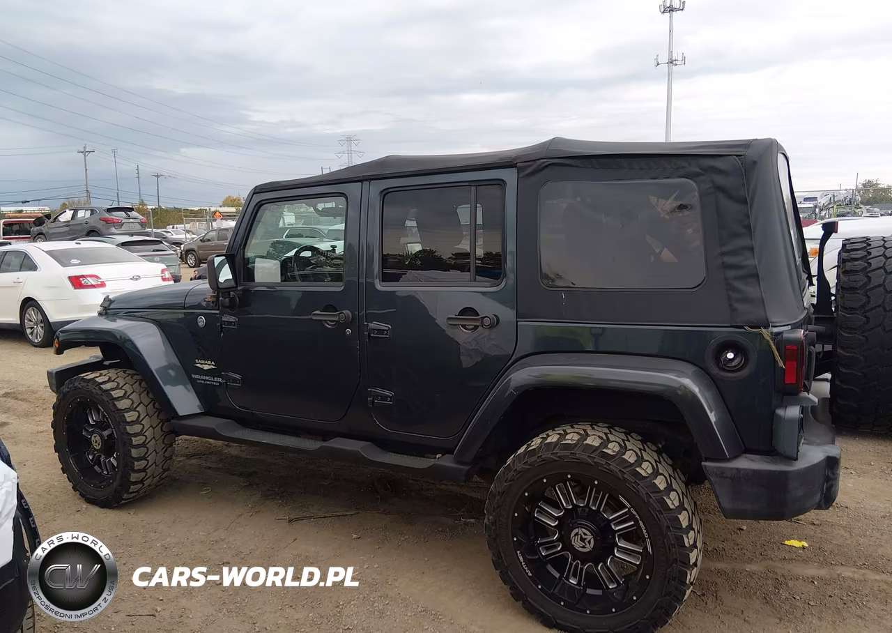 2007 Jeep Wrangler Unlimited Sahara VIN:1J4GA59187L142104 - 14