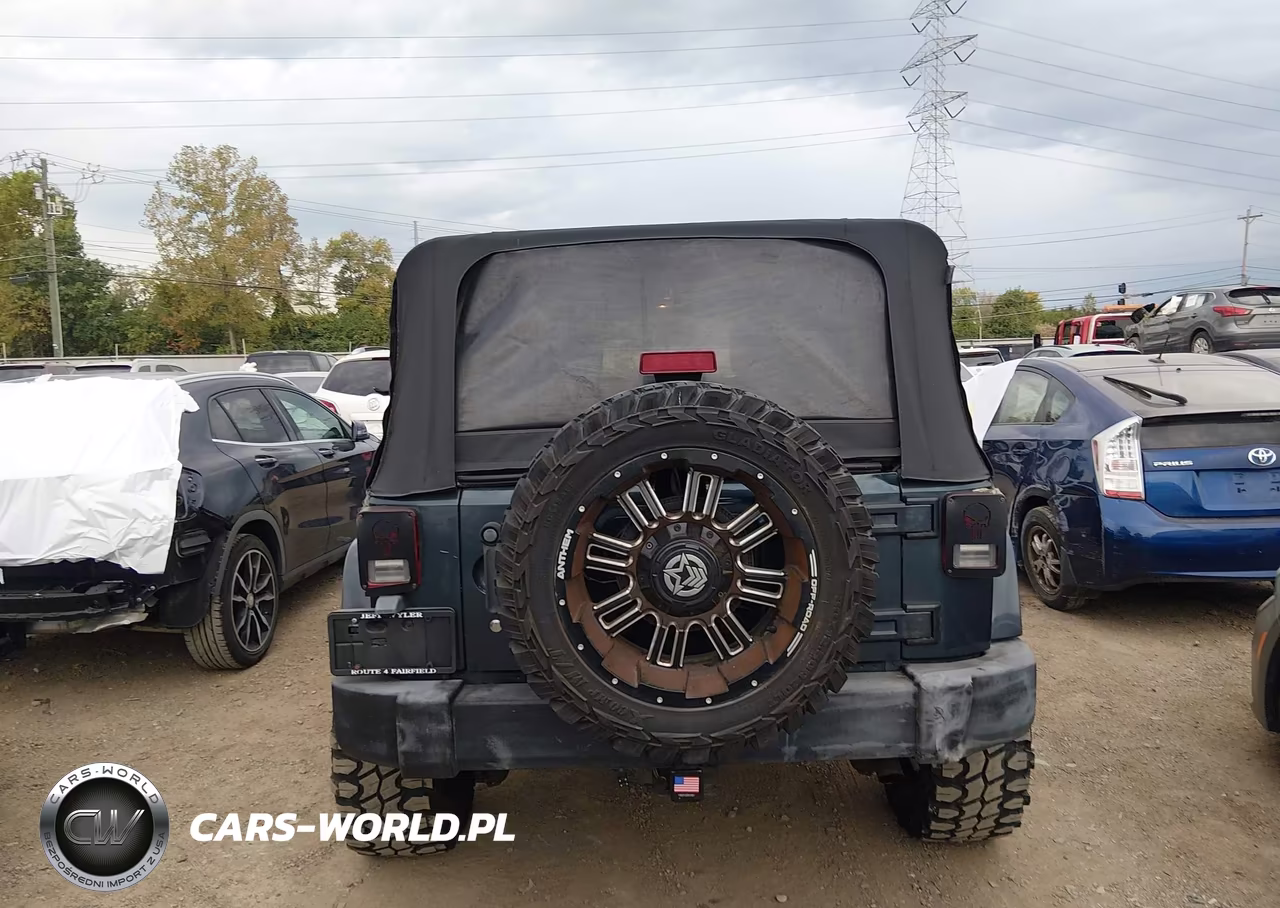 2007 Jeep Wrangler Unlimited Sahara VIN:1J4GA59187L142104 - 16